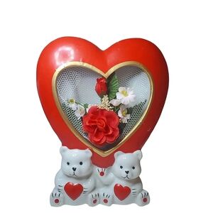 Vintage heart shaped ceramic frame with flowers